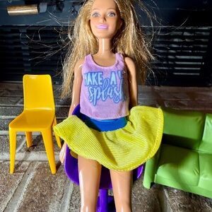 Barbie doll in make a splash tank and yellow Vinatge skirt doll included
